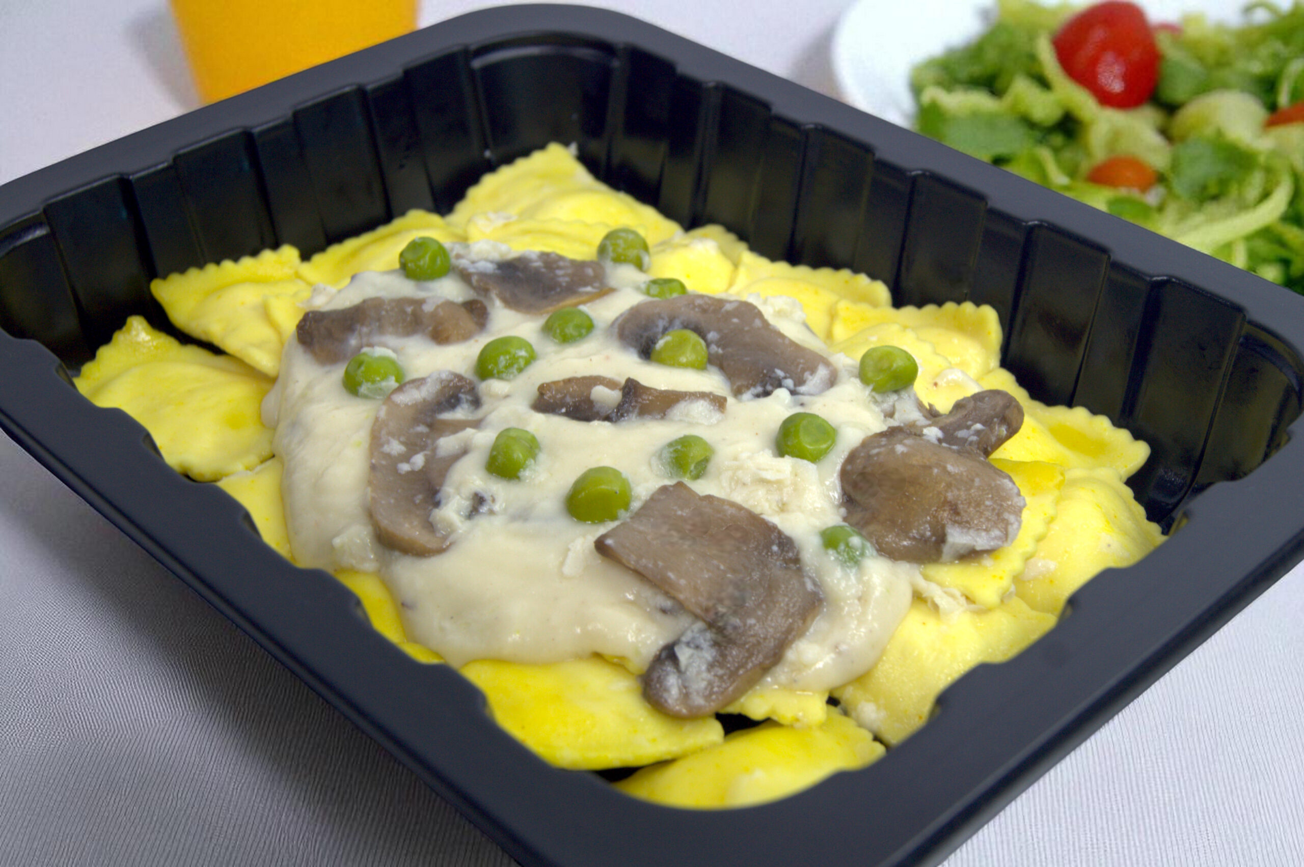 Ravioles de Ricota con Salsa Cremosa de Champiñones